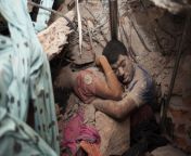 A Final Embrace: The bodies of two workers are uncovered amidst the rubble of the Rana Plaza factory collapse, which crushed to death 1,100 Bangladeshi garment workers making cut-piece clothes for Western brands / Taslima Akhter [NSFW] [5616 × 3744] from www xxx videos taslima nasrin