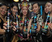 4 years ago today: Girls with multicultural traditional dress holding the three new reveal Malaysia limited-edition designs of Guinness Foreign Extra Stout in Kuala Lumpur. from artis malaysia bogel sexads indian